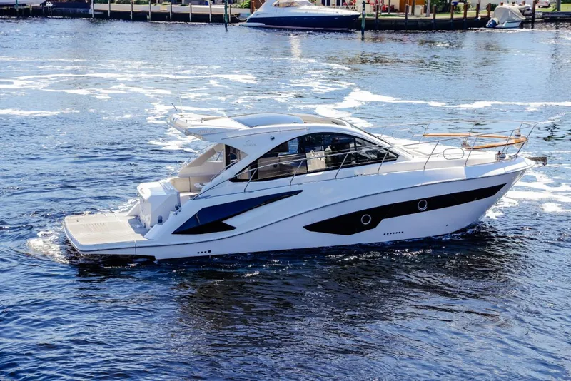 Slide: The Image of 2021 Evolve 400HT yacht cruising on a sunny day. - 0
