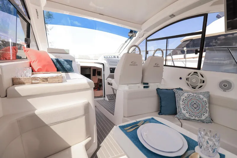 Slide: The Image of Luxurious interior of 2021 Evolve 400HT yacht with elegant seating and dining area. - 27