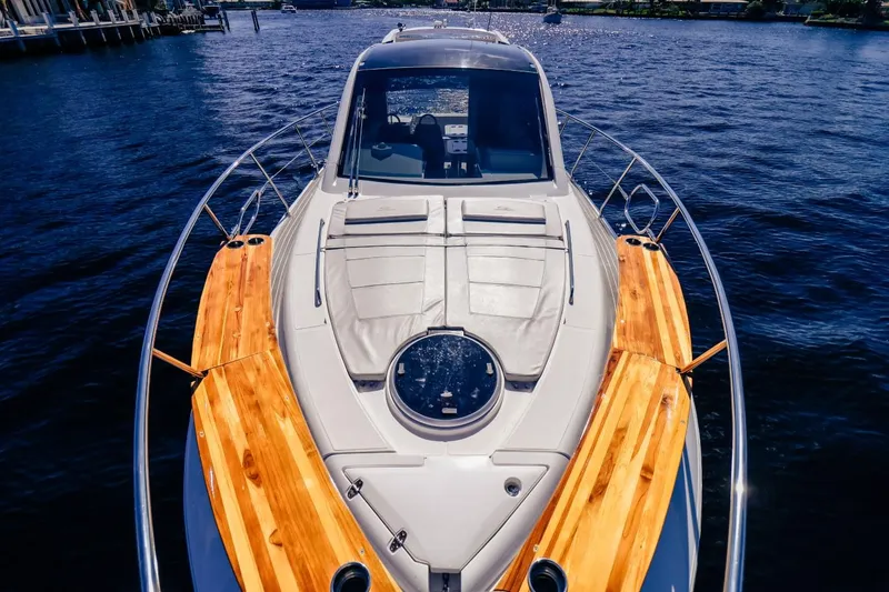 Slide: The Image of Evolve 400HT 2021 yacht with wooden deck details on a sunny day. - 4