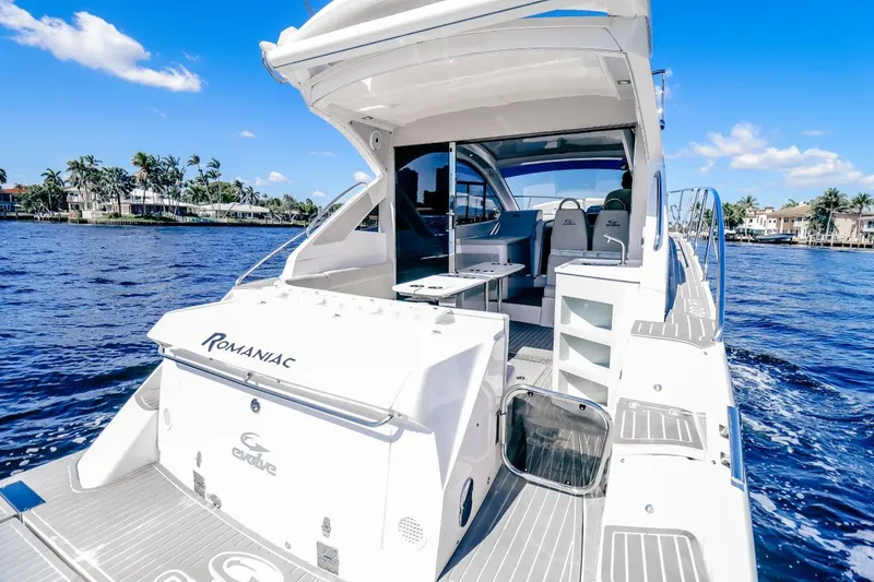 Slide: The Image of Luxury Evolve 400HT yacht cruising on a sunny day, 2021 model. - 5