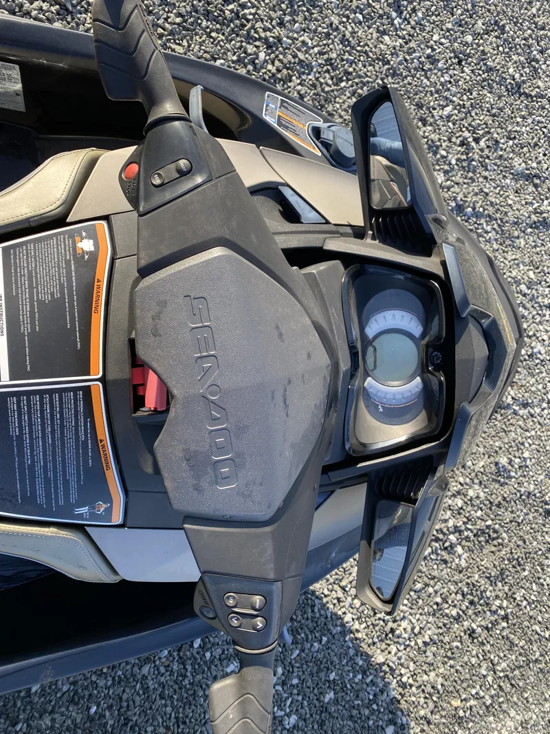 Slide: The Image of 2017 Sea-Doo GTX 155 dashboard and controls on gravel background. - 6