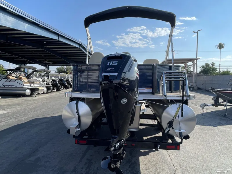 Slide: The Image of 2023 Crest 200 Classic Fish pontoon boat with Mercury 115 engine, rear view. - 4