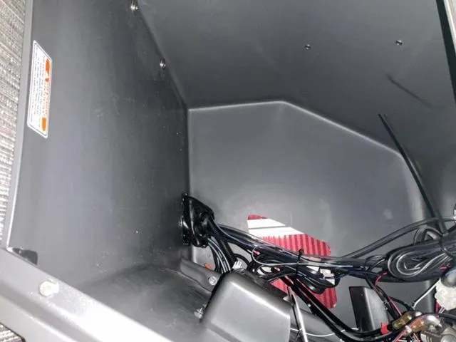 Slide: The Image of Storage compartment of 2024 Bennington 22 SVSR-SPS boat with wrapped life jackets. - 18