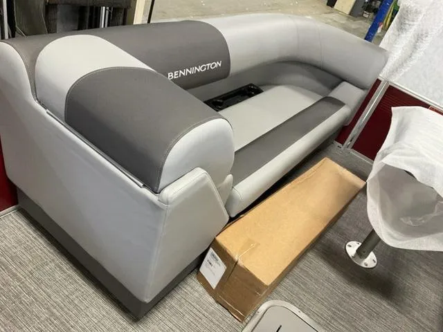 Slide: The Image of 2024 Bennington 22 SVSR-SPS pontoon boat with interior layout and seating. - 7