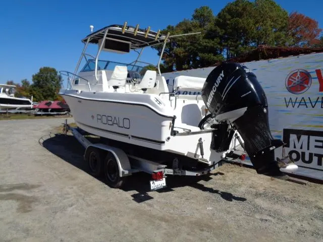 Slide: The Image of 2000 Robalo 2240 Walkaround boat on trailer with Mercury outboard motor. - 18