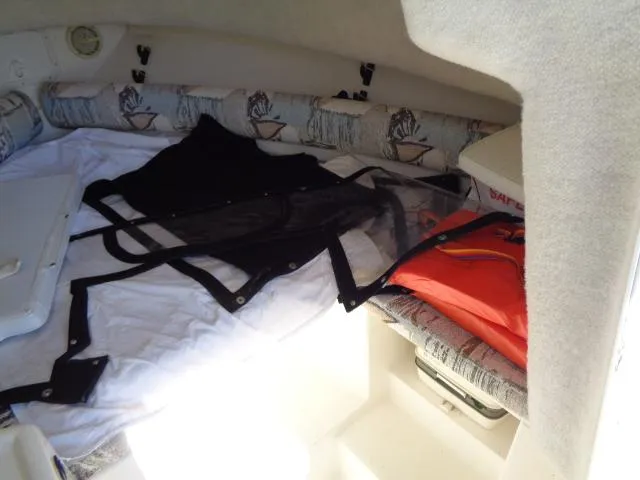 Slide: The Image of Interior cabin of 2000 Robalo 2240 Walkaround boat with safety gear. - 24