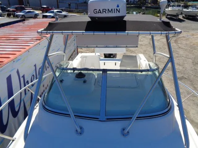 Slide: The Image of 2000 Robalo 2240 Walkaround boat with Garmin radar, docked. - 27