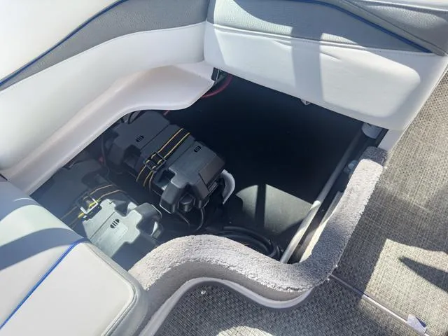 Slide: The Image of 2013 Supra SA 350 boat battery compartment with secured batteries. - 25