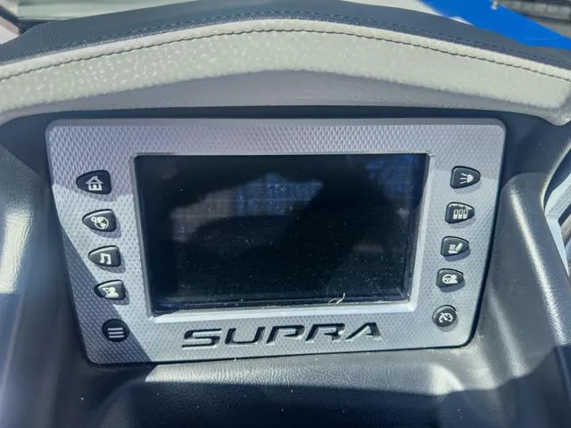 Slide: The Image of 2013 Supra SA 350 dashboard display with control buttons. - 33