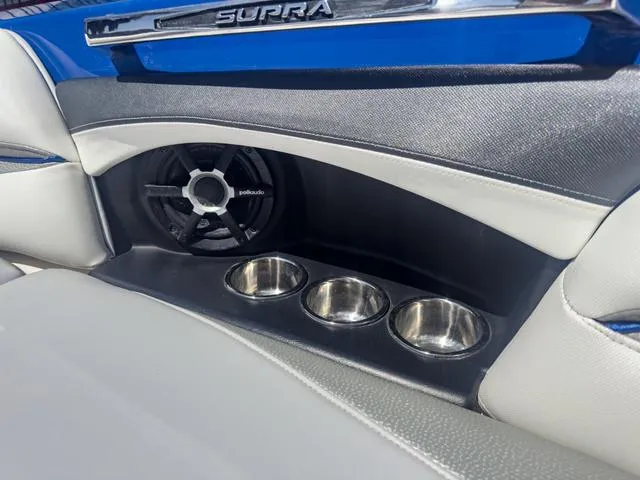 Slide: The Image of 2013 Supra SA 350 boat interior with speaker and cup holders. - 45