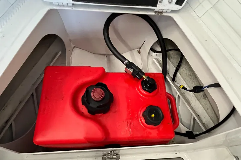 Slide: The Image of Red fuel tank in 2022 Highfield SP300 boat compartment. - 9