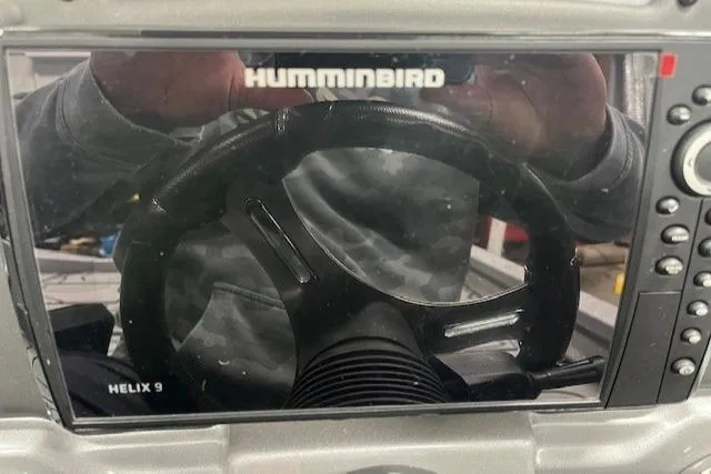 Slide: The Image of Humminbird Helix 9 fishfinder on 2022 Express XPRESS X19PRO boat dashboard. - 12