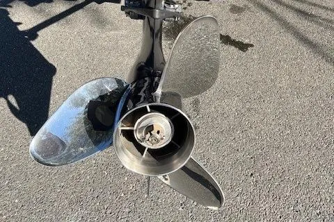 Slide: The Image of 2022 Express XPRESS X19PRO boat propeller on asphalt background. - 4