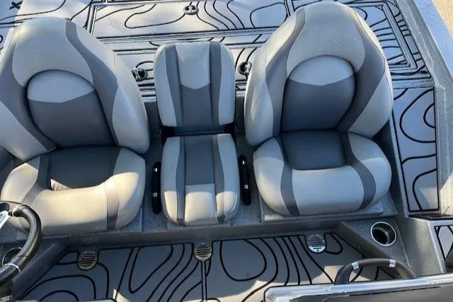 Slide: The Image of 2022 Express XPRESS X19PRO boat seats with modern gray and black design. - 7