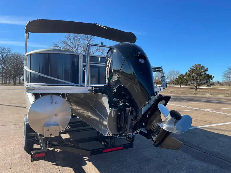 Slide: The Image of 2024 Barletta ARIA 22QC pontoon boat with outboard motor on trailer. - 10