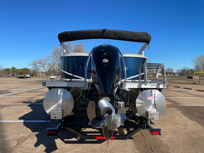 Slide: The Image of 2024 Barletta ARIA 22QC pontoon boat with outboard motor, rear view. - 11