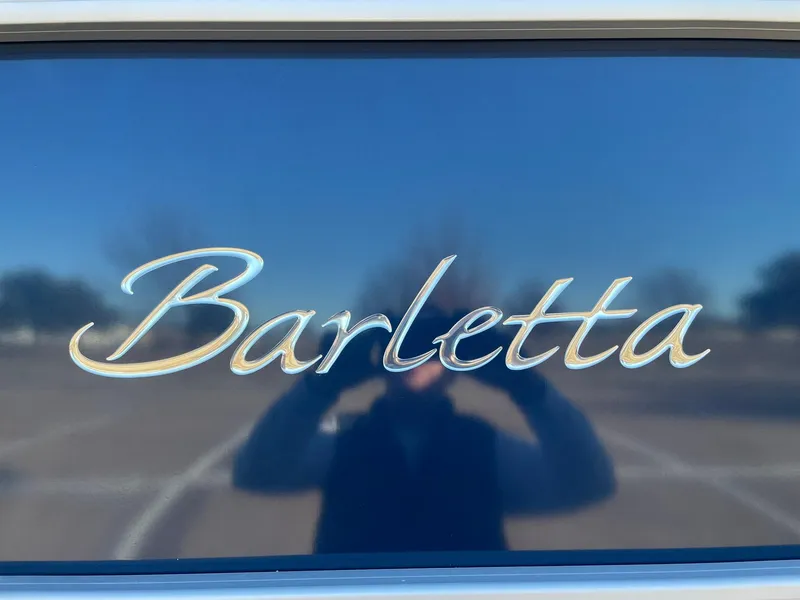 Slide: The Image of Barletta logo on 2024 Barletta ARIA 22QC boat. - 19