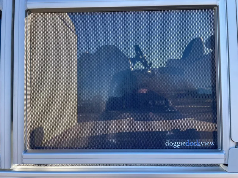 Slide: The Image of 2024 Barletta ARIA 22QC doggie dock view window with mesh screen. - 21