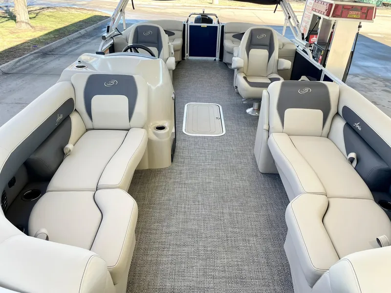Slide: The Image of 2024 Barletta ARIA 22QC pontoon boat interior with luxurious seating and modern design. - 25
