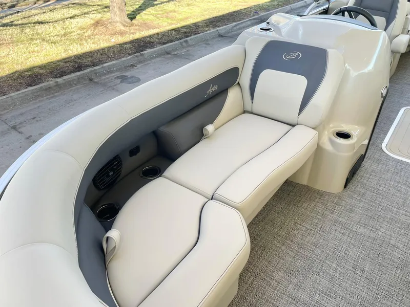 Slide: The Image of 2024 Barletta ARIA 22QC pontoon boat with luxurious seating and cup holders. - 27