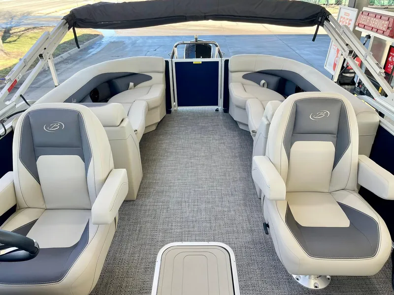Slide: The Image of 2024 Barletta ARIA 22QC pontoon boat interior with plush seating and modern design. - 28