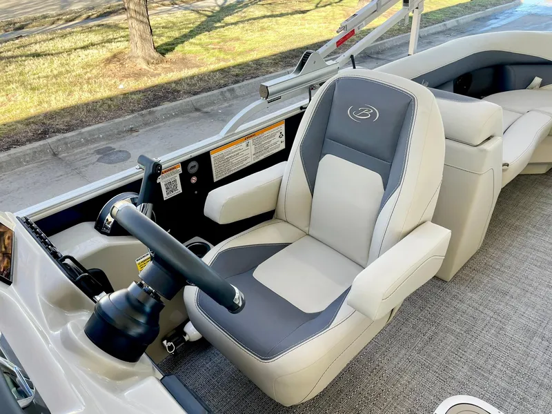 Slide: The Image of 2024 Barletta ARIA 22QC boat captain's chair and helm station. - 30