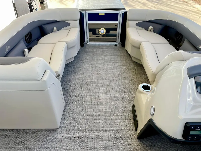 Slide: The Image of 2024 Barletta ARIA 22QC pontoon boat interior with plush seating and modern design. - 34