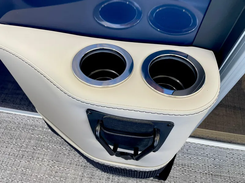 Slide: The Image of Cup holders and storage compartment in the 2024 Barletta ARIA 22QC boat. - 41