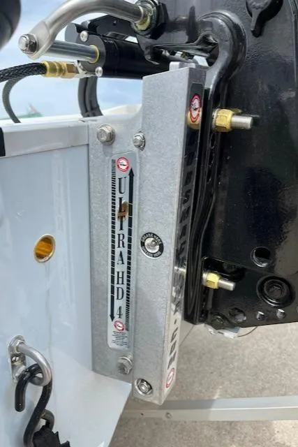 Slide: The Image of Close-up of 2024 Mako 18 LTS boat's Ultra HD4 hydraulic steering system. - 16