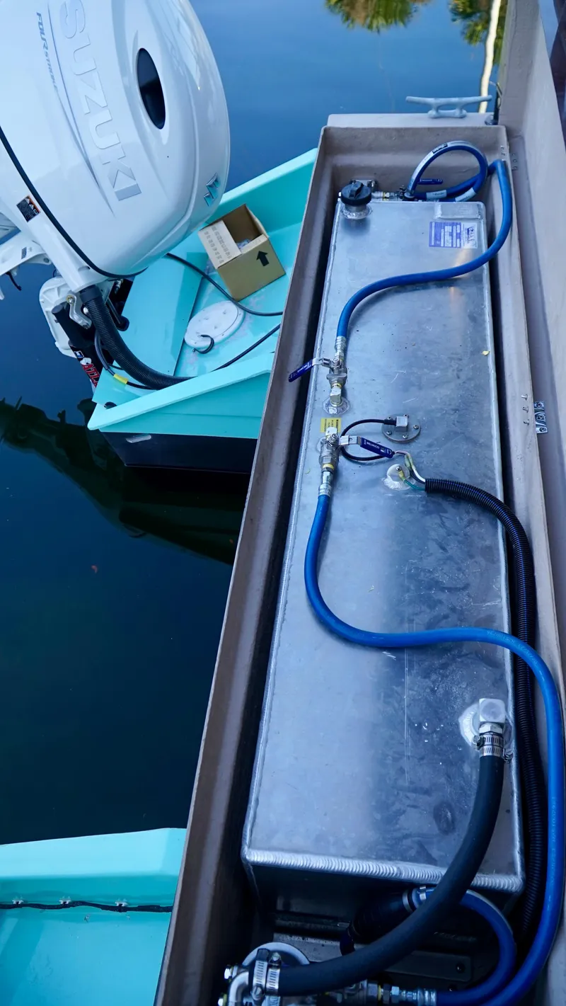 Slide: The Image of 2024 A&M Manufacturing BullDog 34 boat engine and fuel system. - 2