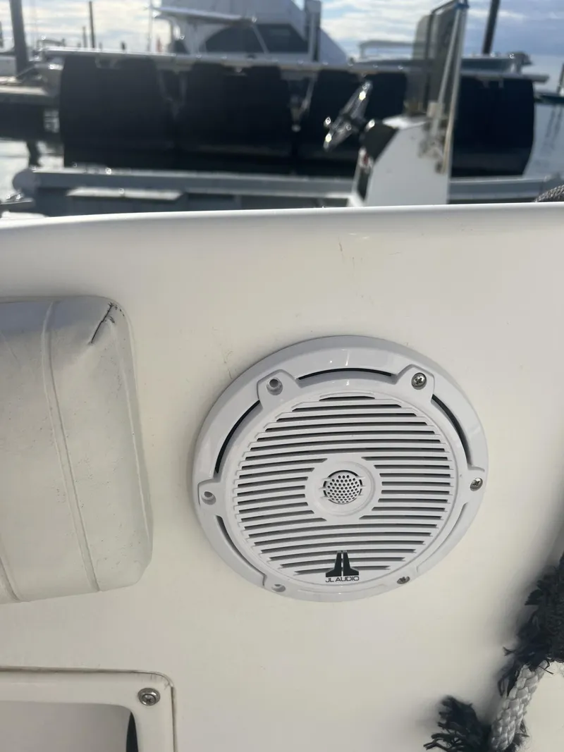 Slide: The Image of Close-up of a speaker on a 2005 Cobia 314 Center Console boat. - 11