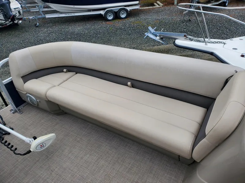 Slide: The Image of 2022 Sun Tracker Party Barge 18 DLX pontoon boat with beige seating. - 9
