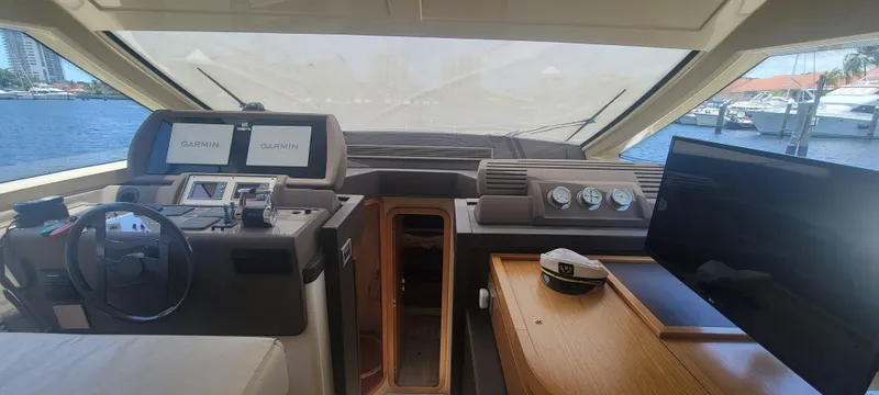 Slide: The Image of Interior helm of 2009 Ferretti Yachts 470 with navigation equipment and controls. - 36