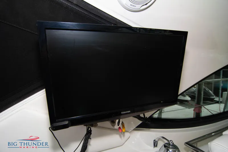 Slide: The Image of Toshiba TV mounted on 2012 Sea Ray 410 Sundancer yacht interior. - 22