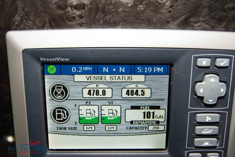 Slide: The Image of Sea Ray 410 Sundancer 2012 vessel status display showing speed, fuel, and engine data. - 31