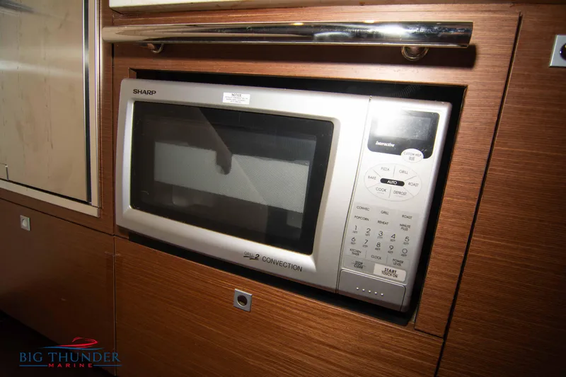 Slide: The Image of Built-in microwave in 2012 Sea Ray 410 Sundancer yacht kitchen. - 49