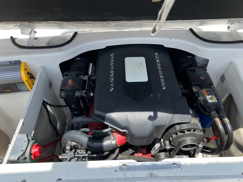 Slide: The Image of 2003 Four Winns 190 Horizon boat engine compartment with Volvo Penta engine. - 11