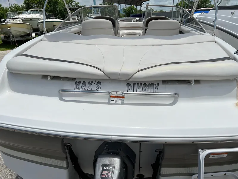 Slide: The Image of 2003 Four Winns 190 Horizon boat with Max's Dinghy name on the stern. - 5