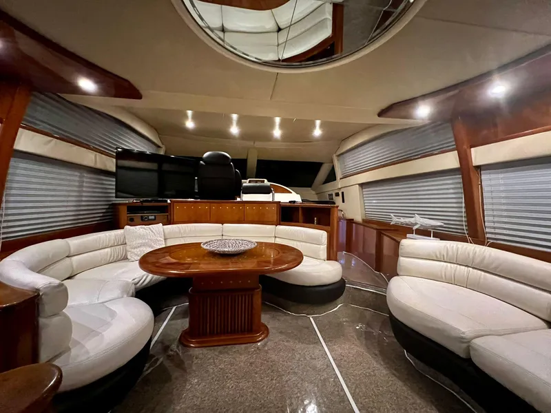 Slide: The Image of Luxurious interior of a 2001 Azimut 58 yacht with elegant seating and modern amenities. - 6