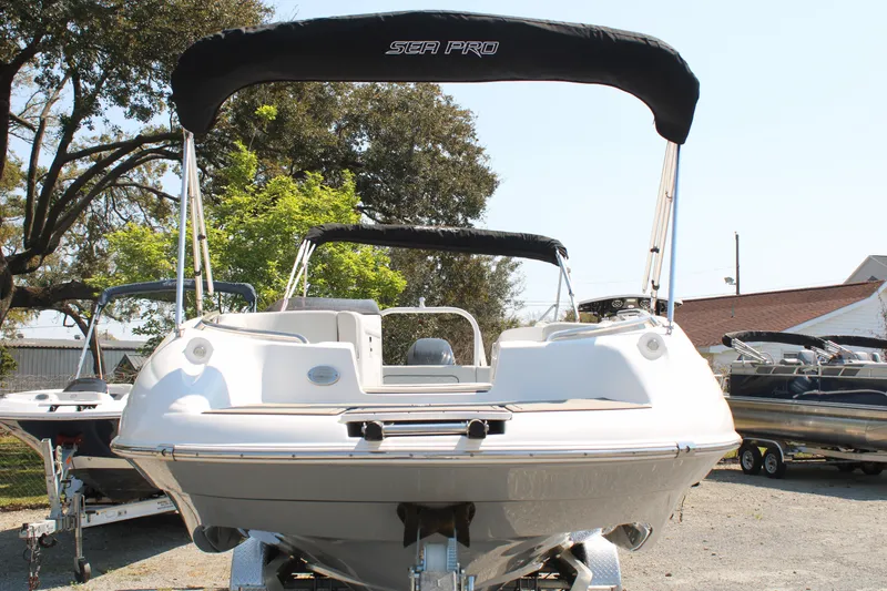 Slide: The Image of 2022 Sea Pro Citation 2400 boat with canopy, front view. - 2