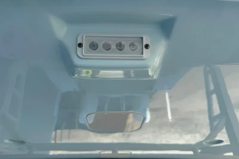 Slide: The Image of LED light fixture on 2025 World Cat 260 DC-X boat ceiling. - 18