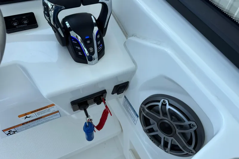 Slide: The Image of 2025 World Cat 260 DC-X boat controls and speaker detail. - 23