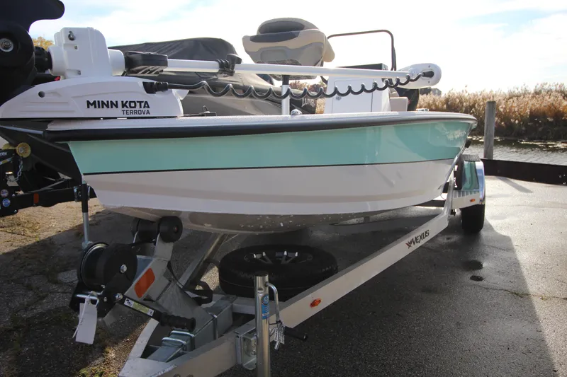 Slide: The Image of 2023 Vexus AVX 2180 CC boat on trailer with Minn Kota Terrova motor. - 12