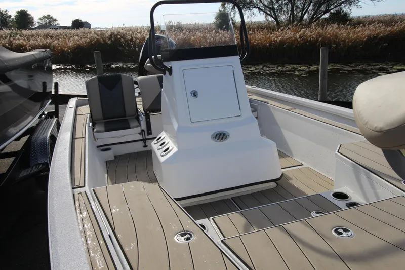 Slide: The Image of 2023 Vexus AVX 2180 CC boat interior with console and seating. - 16