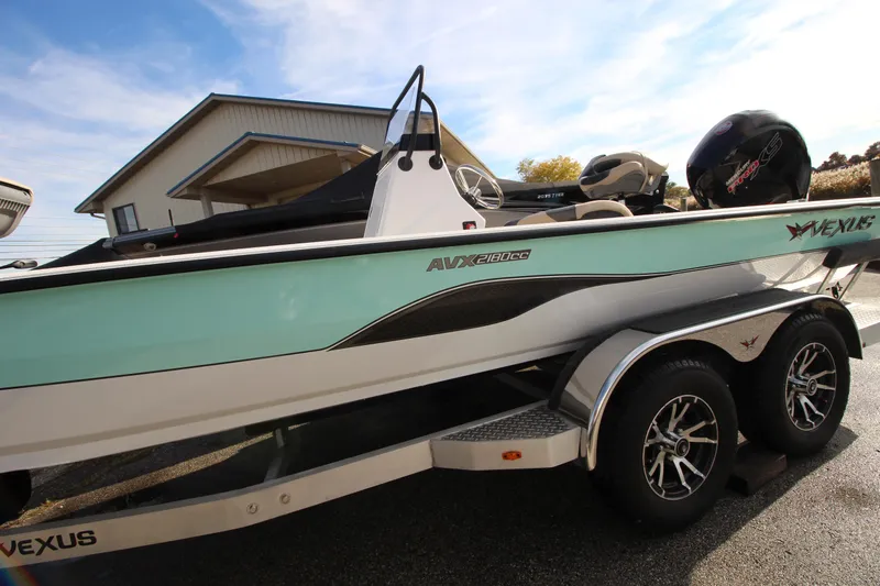 Slide: The Image of 2023 Vexus AVX 2180 CC boat on trailer, side view. - 23