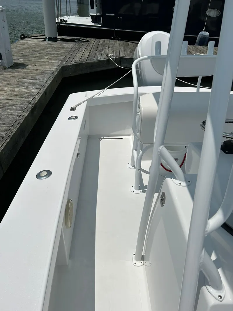 Slide: The Image of 2019 Albemarle CAPPS Custom Center Console boat docked at marina. - 10