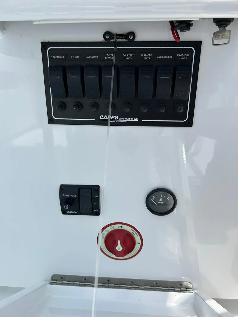 Slide: The Image of Control panel of a 2019 Albemarle CAPPS Custom Center Console boat. - 11