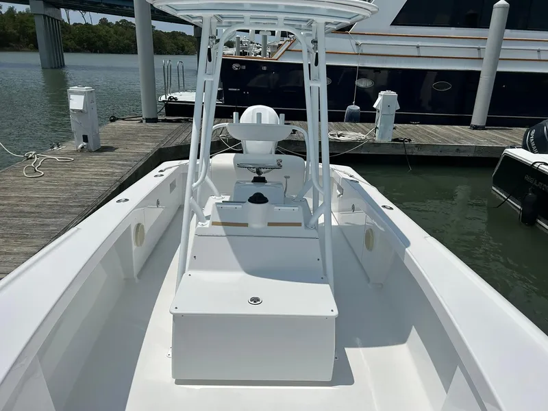 Slide: The Image of 2019 Albemarle CAPPS Custom Center Console boat docked at marina. - 8