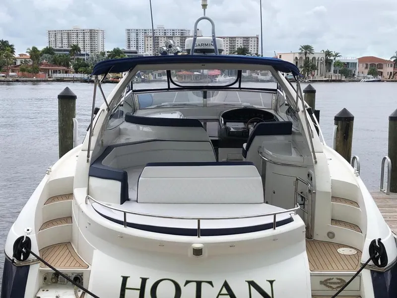 Slide: The Image of 2003 Sunseeker Portofino 46 yacht docked at marina, rear view. - 18