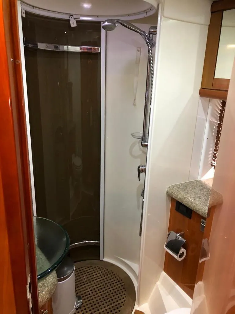 Slide: The Image of 2003 Sunseeker Portofino 46 yacht bathroom with shower and modern fixtures. - 31